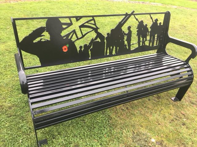 THE WAR MEMORIAL BENCH We were approached by a local committee to design and fabricate a war memorial bench for a community garden. The design was based on a collection of silhouettes of soldiers who served in both World Wars as well as modern images. The back rest was designed in house and laser cut using 8mm steel plate.